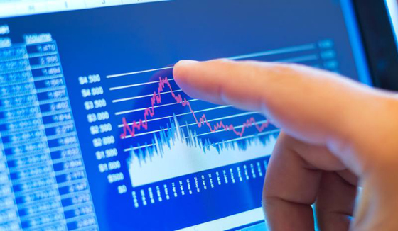 Graph on Touch Screen Tablet Photo: User Interacting with Business Graph on Tablet Device